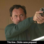 Jude Law aiming a gun in The Order: This time...Dickie came prepared.